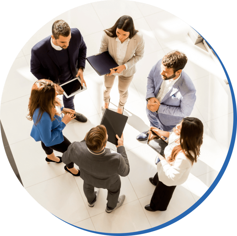 Coggno team members meeting in an office, viewed from above